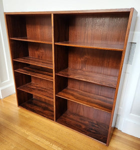 Beautiful rosewood book shelves with 7 adjustable shelves.  Works well on its own or on top our matching credenza. Made in Denmark by Poul Dogvad for Hundevad & Co.- Cook Street Vintage