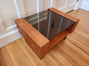 Heavy teak coffee table with smoke glass top and second shelf- Cook Street Vintage