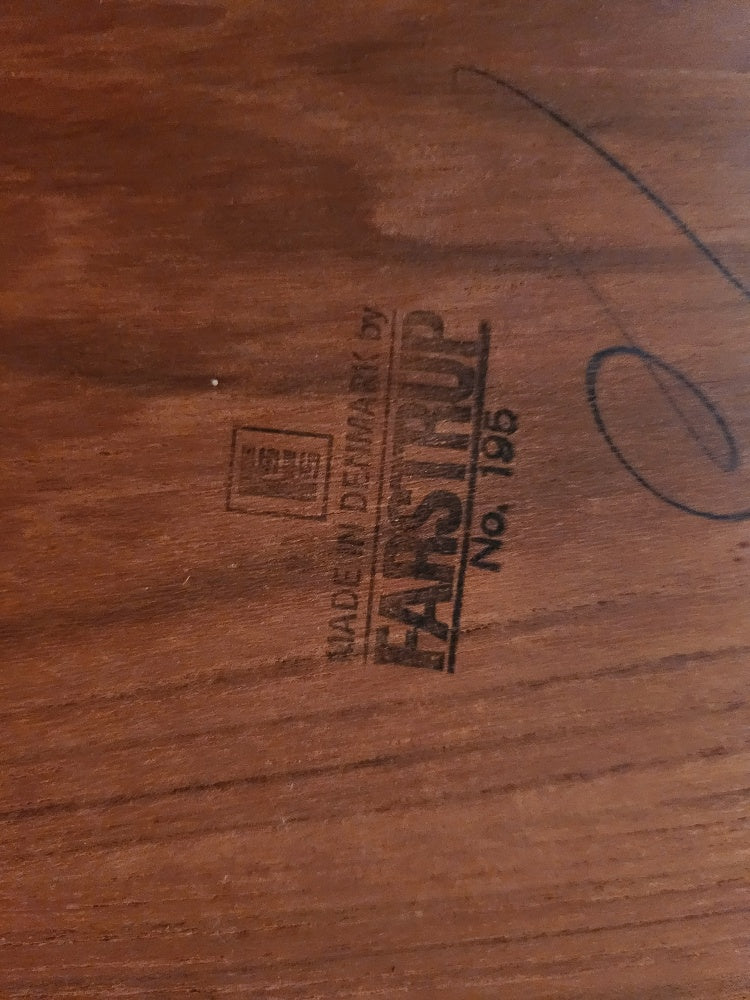 Stamp on underside of MCM teak dining table by Farstrup. Made in Denmark- Cook Street Vintage