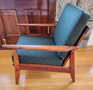 Side view of Vintage walnut mid-century lounge chair recently refinished and reupholstered in dark green wool Maharam Divina MD by Kvadrat- Cook Street Vintage.