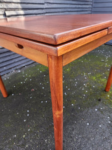 Edge of MCM teak dining tbale with extending leaves- Cook Street Vintage