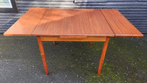 MCM Teak dining table with extended leaves- Cook Street Vintage