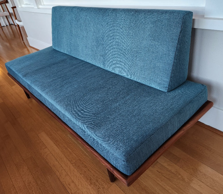 Rare MCM Minerva daybed in solid teak. Newly refinished and reupholstered. Designed by Peter Hvidt and Orla Mølgaard-Nielsen for John Stuart-Cook Street Vintage
