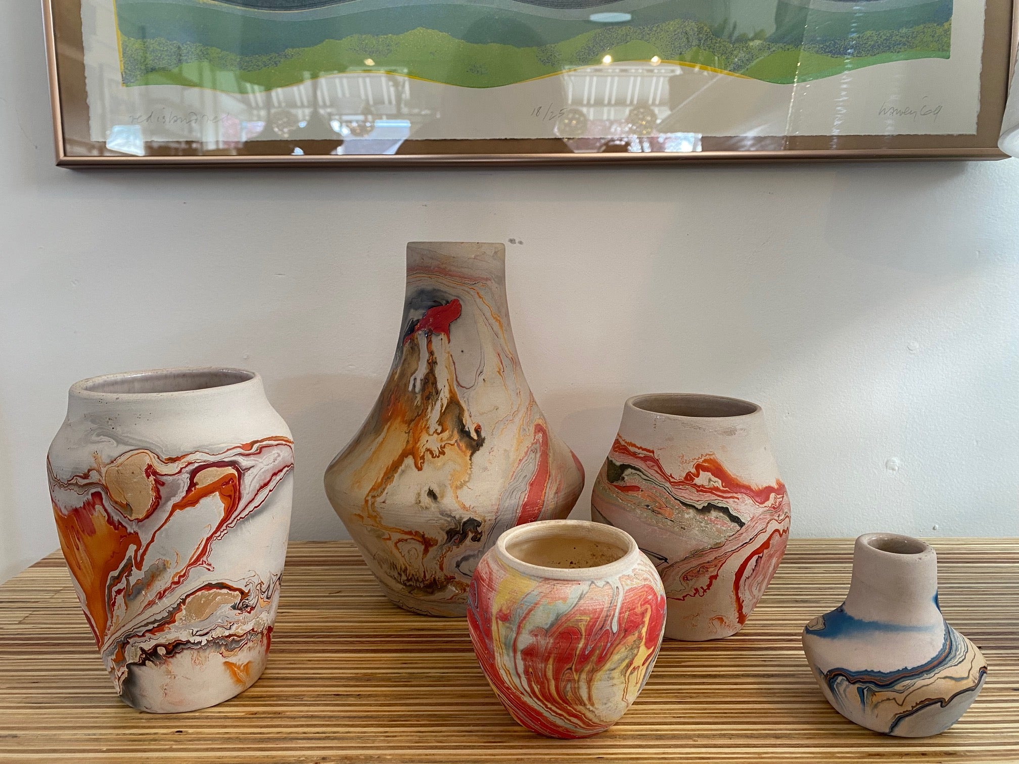 Cllection og Nemadji pottery vase with stunning swirling patterns and vibrant colours that define the beautiy of traditional Nemadji pottery. Stamped on base-Cook Street Vintageo