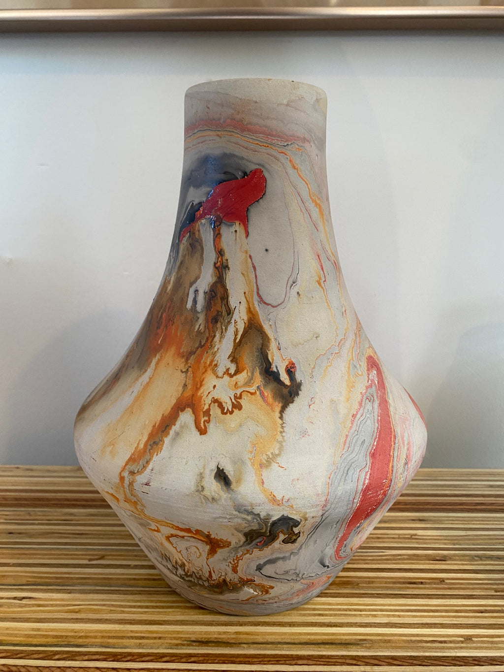 Nemadji pottery vase with stunning swirling patterns and vibrant colours that define the beautiy of traditional Nemadji pottery- Cook Street Vintage