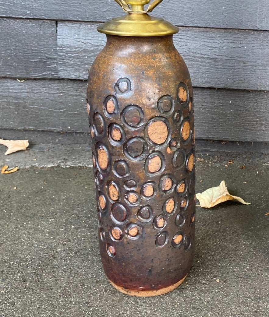 MCM ceramic lamp with circular pattern in brown earth tone matt glaze- Cook Street Vintage