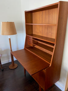 Gorgeous teak secretary with drop-down desk. Multiple storage drawers with dovetail joinery and adjustable shelves. Made in Denmark- Cook Street Vintage