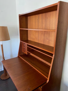 Gorgeous teak secretary with drop-down desk. Multiple storage drawers with dovetail joinery and adjustable shelves. Made in Denmark- Cook Street Vintage