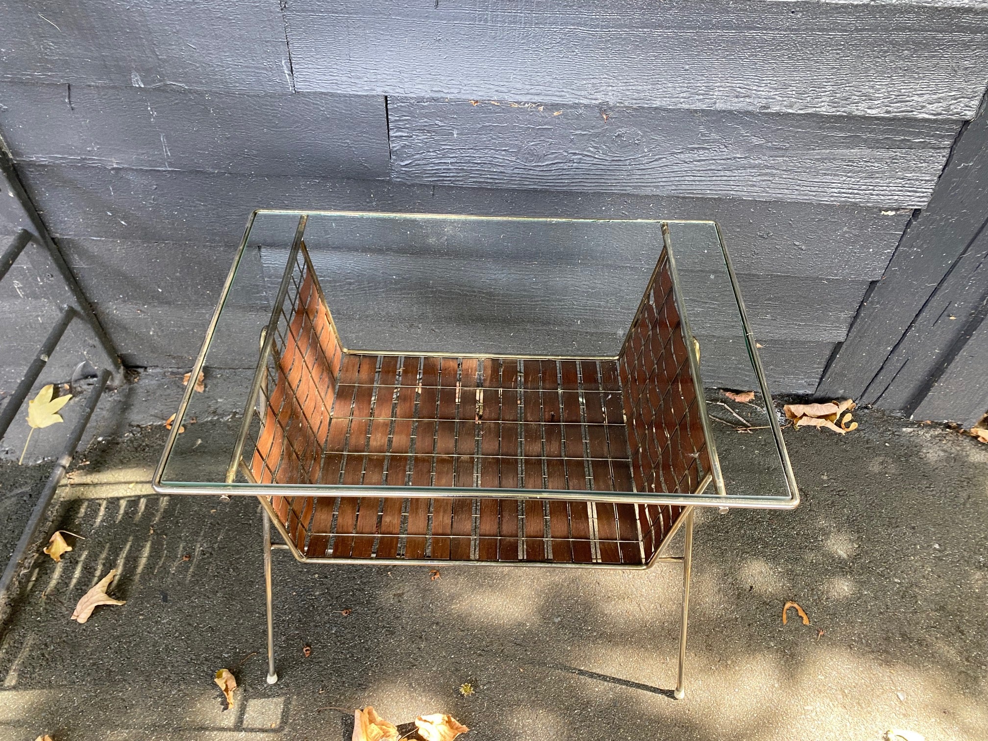 Top view of Mid-century walnut, glass and brass magazine table designed by Tony Paul. Part of his Interlace Collection-Cook Street Vintage