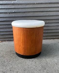 Beautiful round stool with removable cream vinyl top. Interior is in near-perfect condition. Teak with contrasting black painted base. Works well as an ottoman or a side table. Store your wool- or socks! Made in Canada by Walter Depping Furniture- Cook Street Vintage
