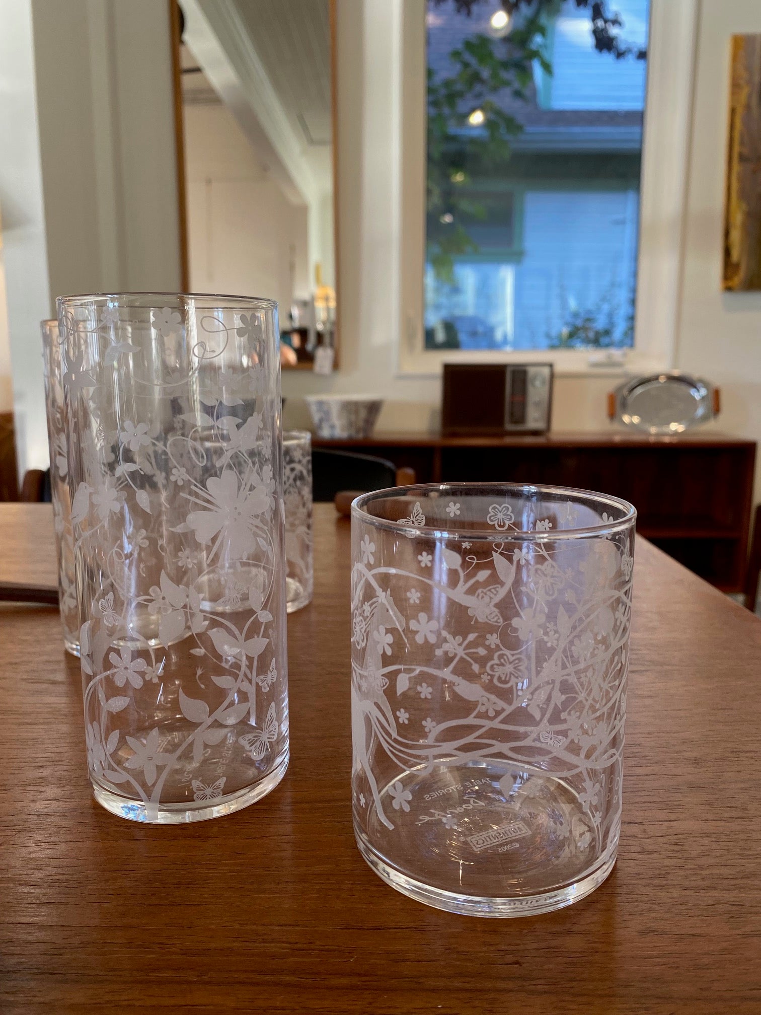 Tord Boontje "Table Stories" highball glass tumbler. Beautiful intricate etched detail of birds and flora. Shown with the Tord Boontje lowball-Cook Street Vintage