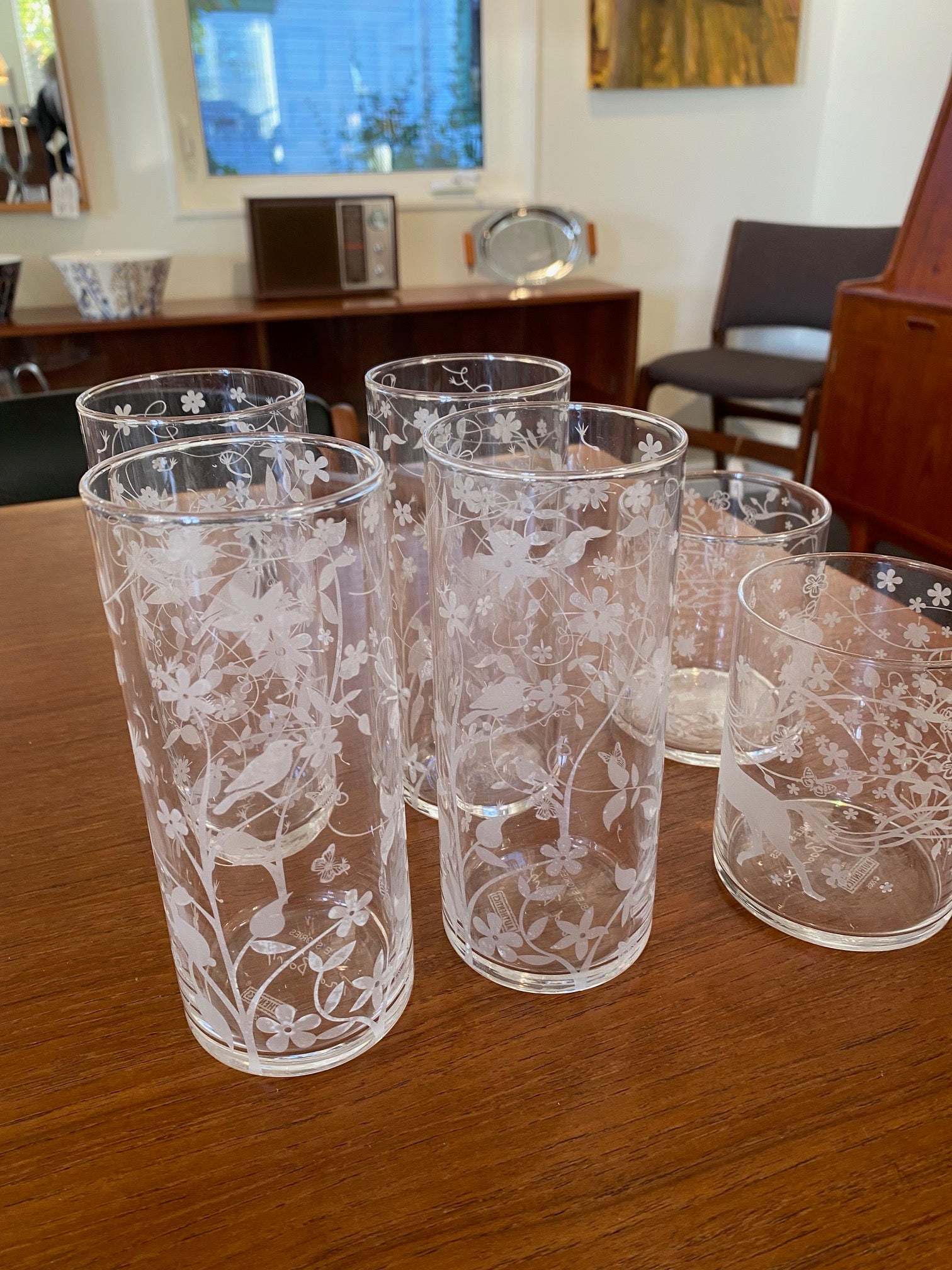 Tord Boontje "Table Stories" highball glass tumbler. Beautiful intricate etched detail of birds and flora. Shown with the Tord Boontje lowball-Cook Street Vintage