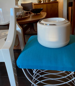 Fabulous 1970s Mid-century modern ice bucket with sleek design and hidden handle in white plastic. Designed by Erik Magnussen for Stelton.  In amazing vintage condition. Made in Denmark-Cook Steet Vintage