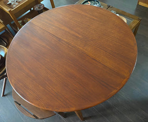 Dyrlund Teak Dining Table with Extending Leaves