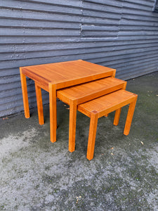 Side view of MCM Set of 3 Danish Teak Nesting Tables. Made in Denmark- Cook Street Vintage