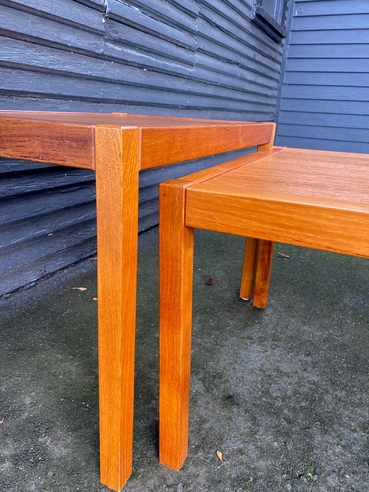 CLose up of legs of vintage teak nesting tables made in Denmark- Cook Street Vintage