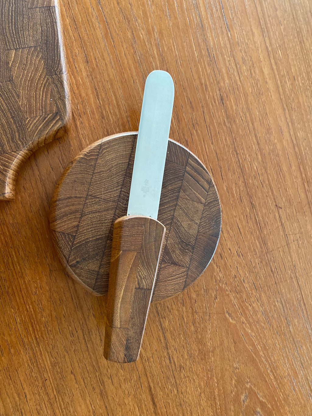 A wonderful small cheese board with spreader designed by Jens Harald Quistgaard for Dansk.- Cook Street Vintage