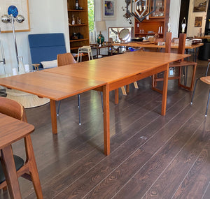 MCM teak dining table extended with leaves pulled out- Cook Street Vintage