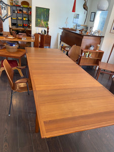 Top view of Scandinavian design MCM teak dining table with beautiful grain and detail- Cook Street Vintage