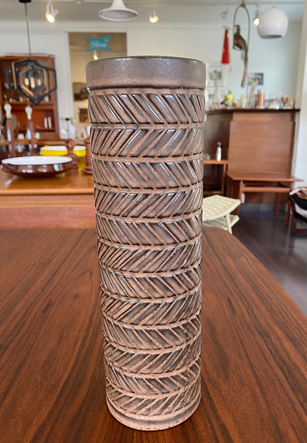 Beautiful MCM earthenware, vase. This vase is one of 7 pieces designed by Ingrid Atterberg in the "Roma" collection. By Upsala. Warm chocolate brown glazes and incised geometric decoration. Model 2684- Cook Street Vintage