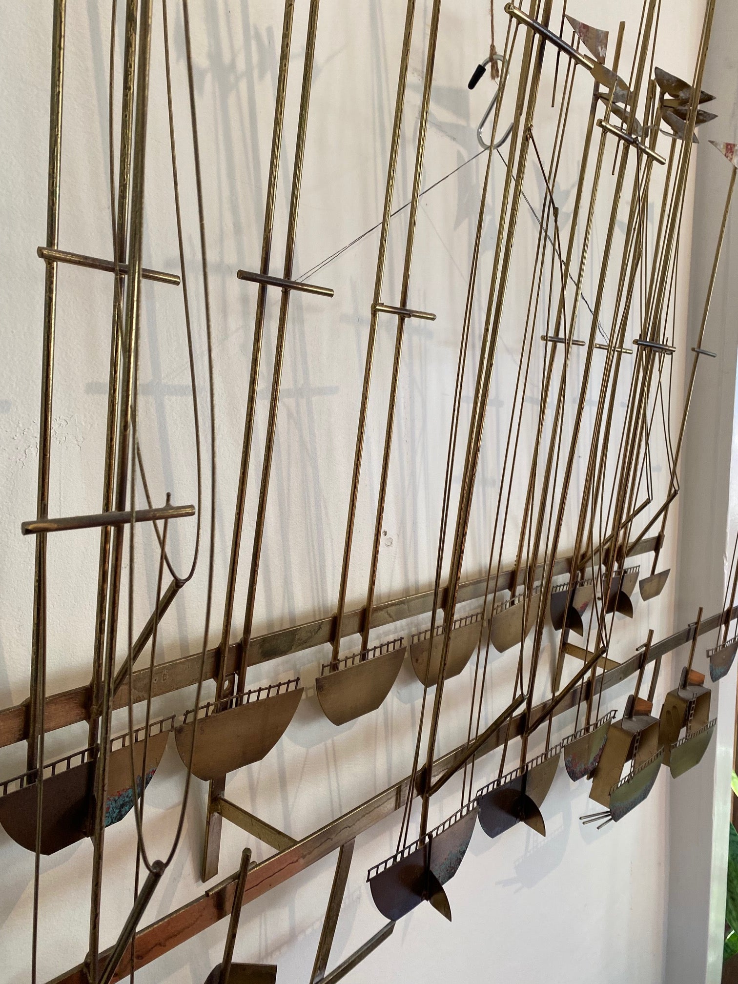 A wonderful example of mid-century fine metal art depicting a harbour with boats and gulls. Attributed to Curtis Jere- Cook Street Vintage