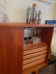 Teak Bar with Sliding Doors and Mirrored Interior