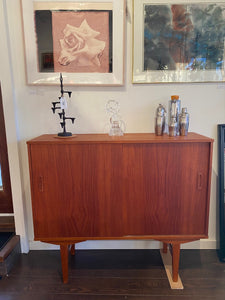 Teak Bar with Sliding Doors and Mirrored Interior