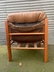 Arne Norell Armless Rosewood Sirocco Safari Chair with original straps and supports. Newly recovered cushions and foam in brown vinyl. Imported by Scanform Colombia. Made in Medellin, Colombia- Cook Street Vintage