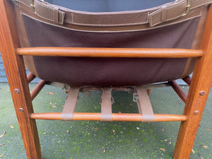 Arne Norell Armless Rosewood Sirocco Safari Chair with original straps and supports. Newly recovered cushions and foam in brown vinyl. Imported by Scanform Colombia. Made in Medellin, Colombia- Cook Street Vintage