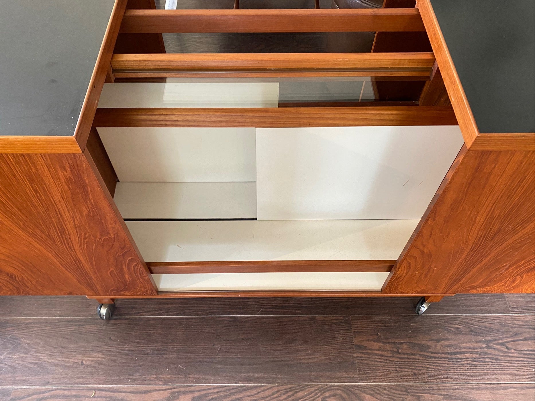 Detail of interior cabinet of Niels Erik Glasdam Expandable Teak Bar Cart- Cook Street Vintage