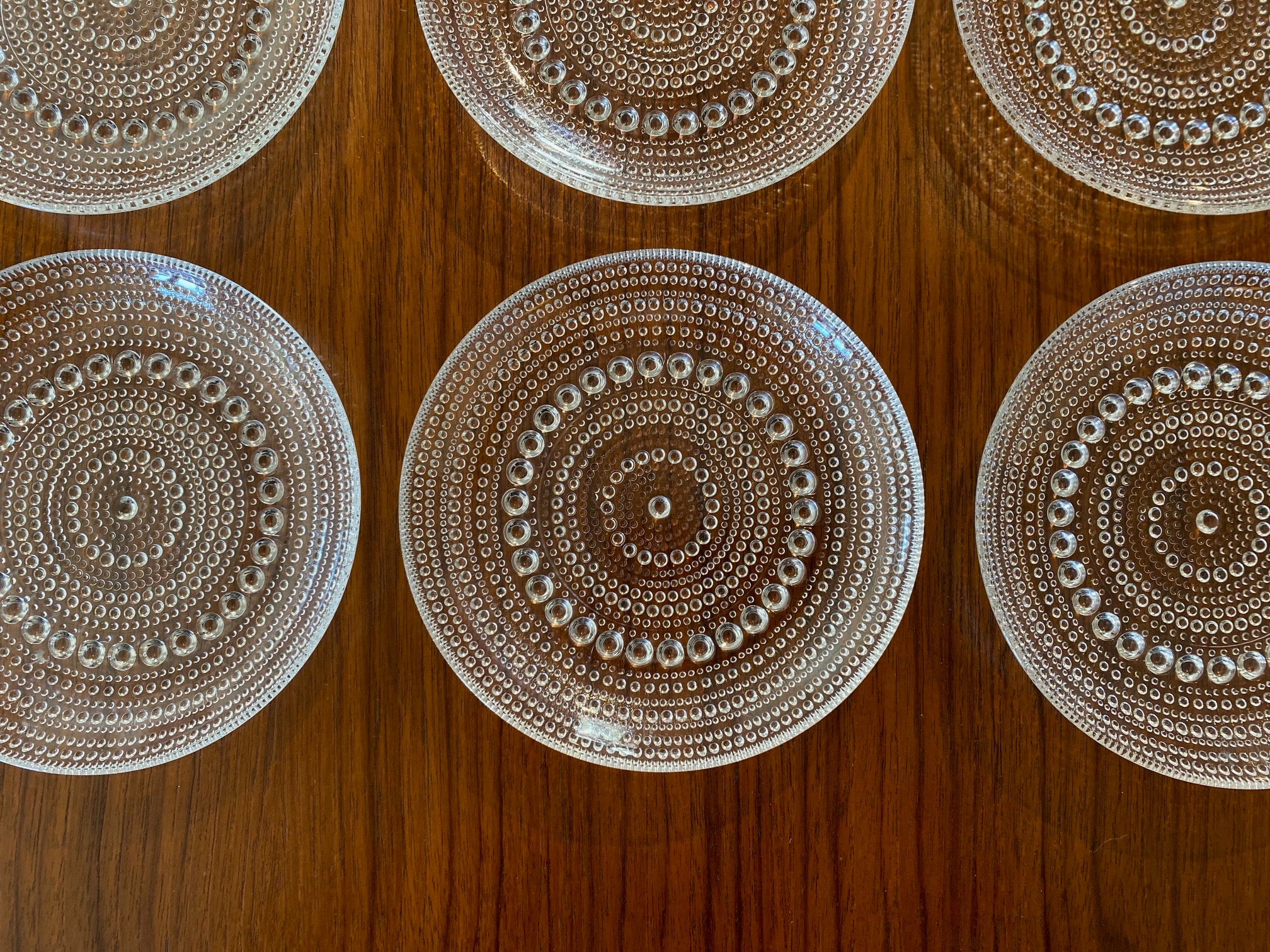 close up of iittala Kastehelmi side dishes in clear glass designed by Oiva Toikka. Made in Finland- Cook Street Vintage