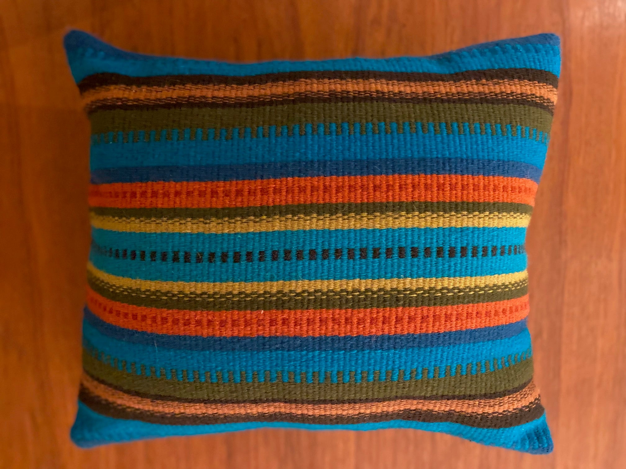 Vibrant Blue, Orange and Brown Striped Woven Pillow