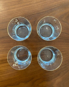 Top rims of Set of four like-new low ball drinking glasses with pheasants and hunters. Images and gold on rim in excellent condition. Made in the USA by Dominion- Cook Street Vintage