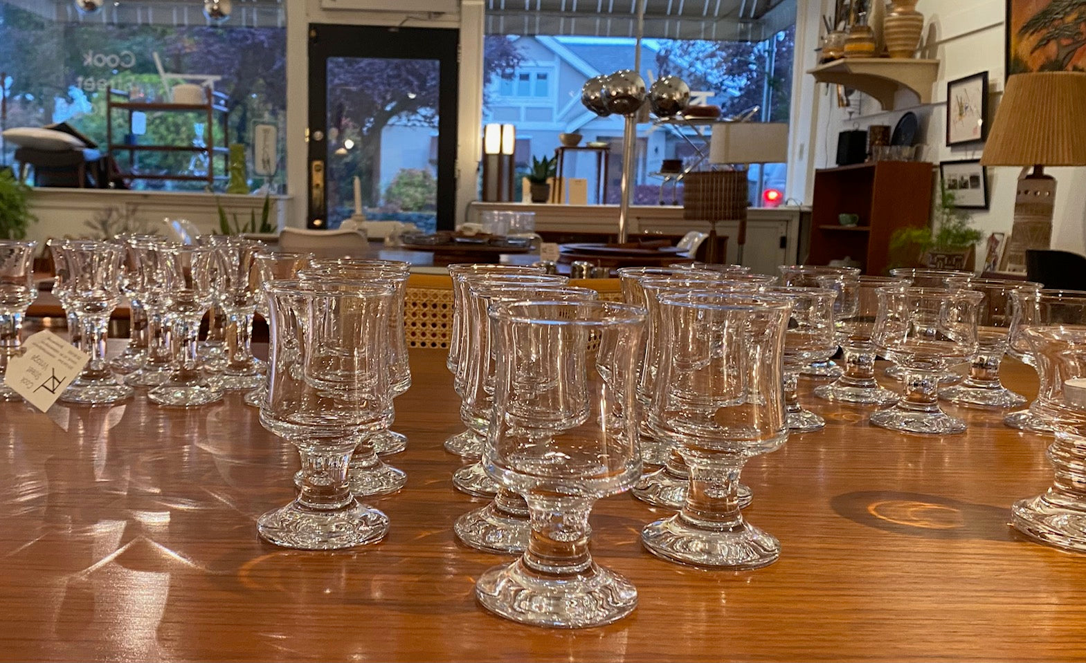 Gorgeous set of 10 mouthblown Per Lutken Ship Glass/ Skibsglas cordial and apertif glasses with our other Holmegaard glassware. Designed by Per Lutken for Holmegaard in 1971- Cook Street Vintage