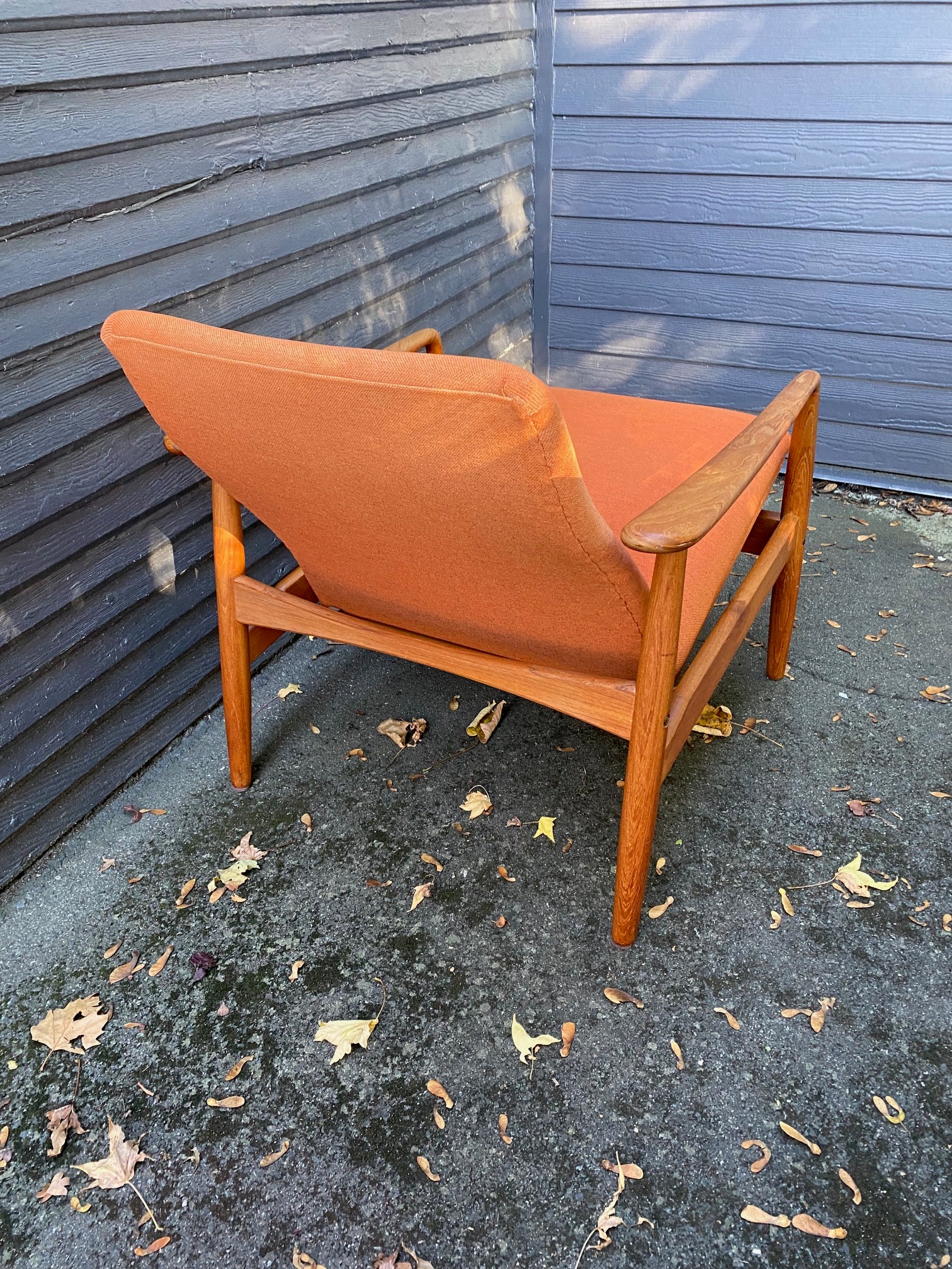 Back side of mid-century modern lounge chair in original orange upholstery by SL Mobler. Attributed to Soren Ladefoged.- Cook Street Vintage