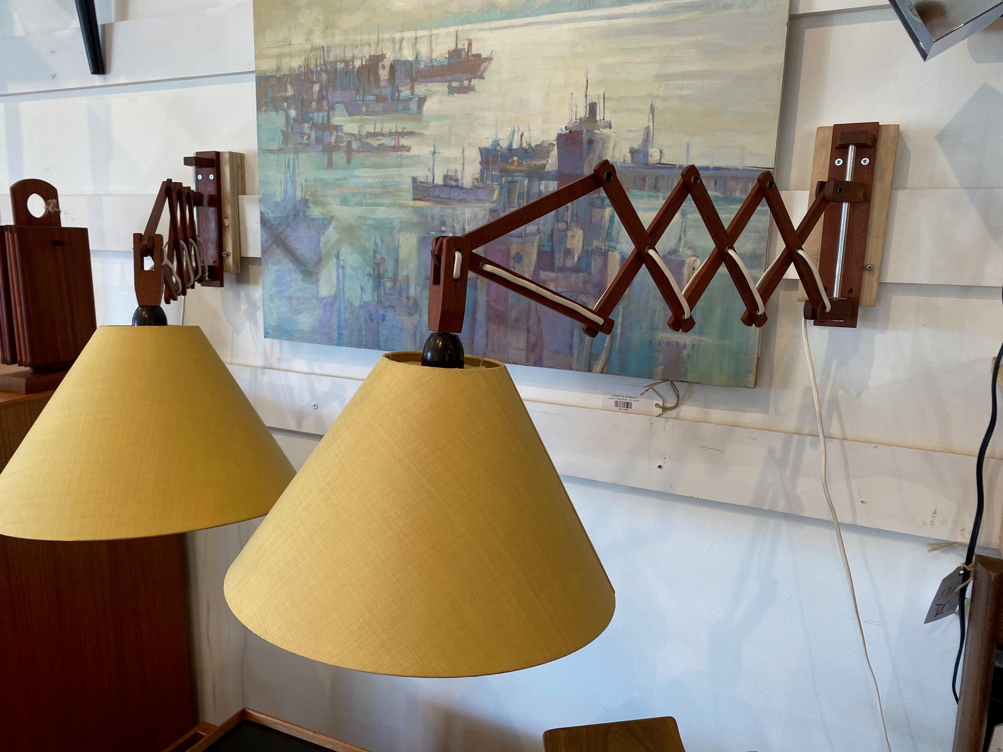 Fantastic pair of mid-century articulating extending wall mounted lamps with yellow linen fabric shades- Cook Street Vintage