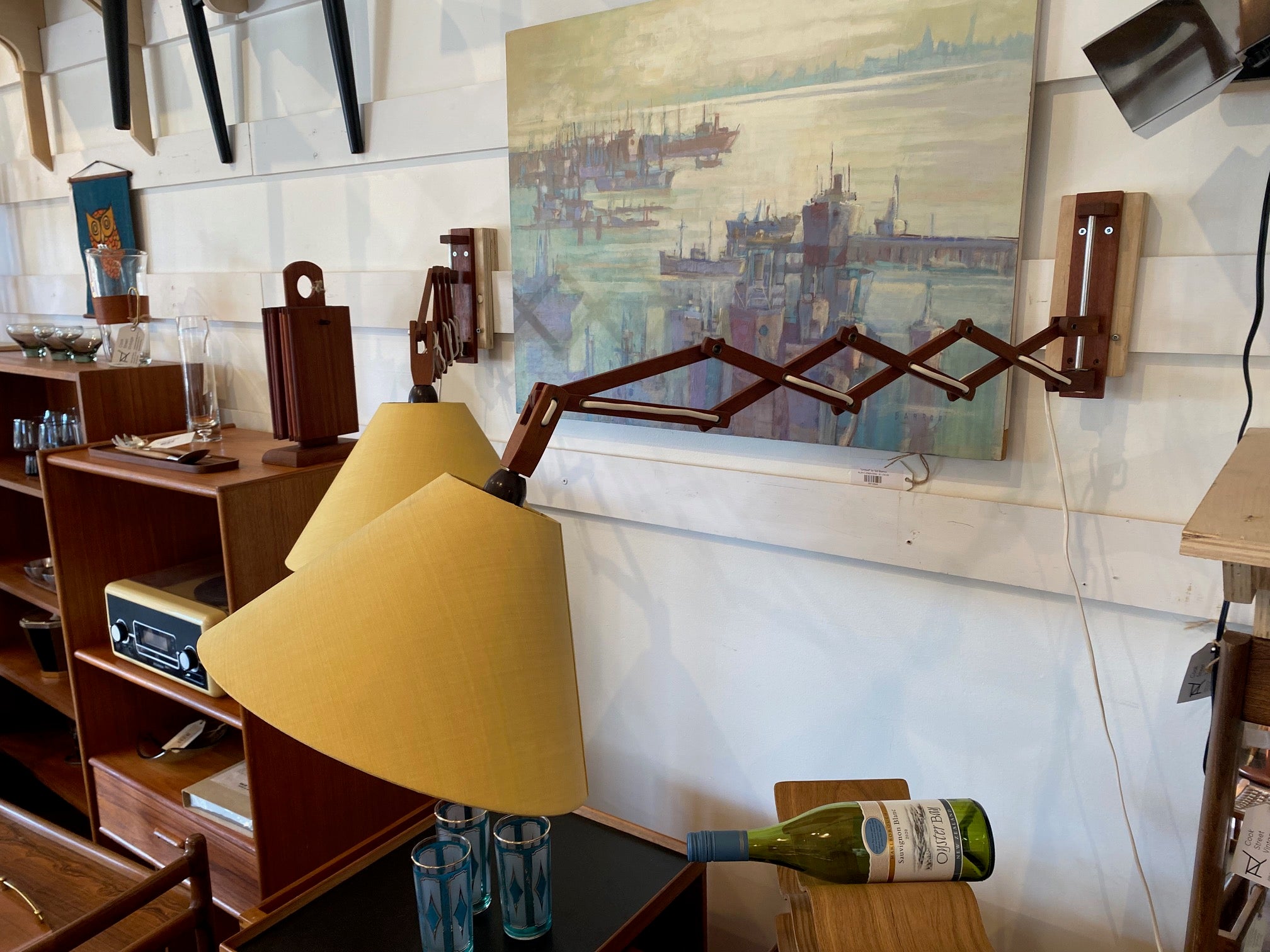 Fully extended Fantastic pair of mid-century articulating extending wall mounted lamps with yellow linen fabric shades- Cook Street Vintage