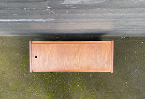 top view with lid. The perfect touch for any room. The original styrofoam inserts accommodate three medium-sized plants. Makeshift wood lid that can transform this unit into a small side table or storage bin- Cook Street Vintage