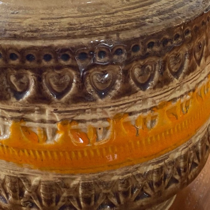 Detail of embossed graphics on our 1960s "Sahara" Brown and Yellow Bitossi Vase- Cook Street Vintage