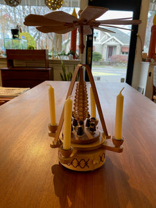 Vintage musical box with charming choir singers. Made in Switerland by Reuge, this sweet little decoration holds 4 candles that powers a fan above the wodden Christmas tree. Beautiful details. With Original box. Vive le vent. Jingle bells. Wann Die Glocken lauren- Cook Street Vintage