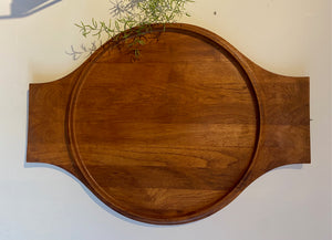 Extra large round 1960s Dansk teak tray with serving handles. Designed by Jens Harald Quistgaard for Dansk. Made in Denmark- Cook Street Vintage