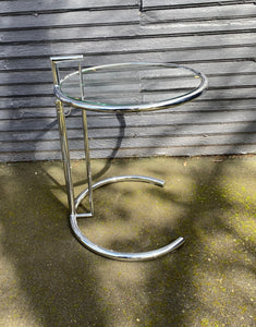 Nice chrome and glass side table that is height adjustable. A great replica of the E1027 originally designed by Eileen Grey- Cook Street Vintage