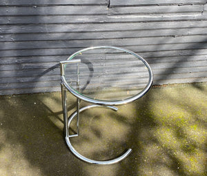 Nice chrome and glass side table that is height adjustable. A great replica of the E1027 originally designed by Eileen Grey- Cook Street Vintage