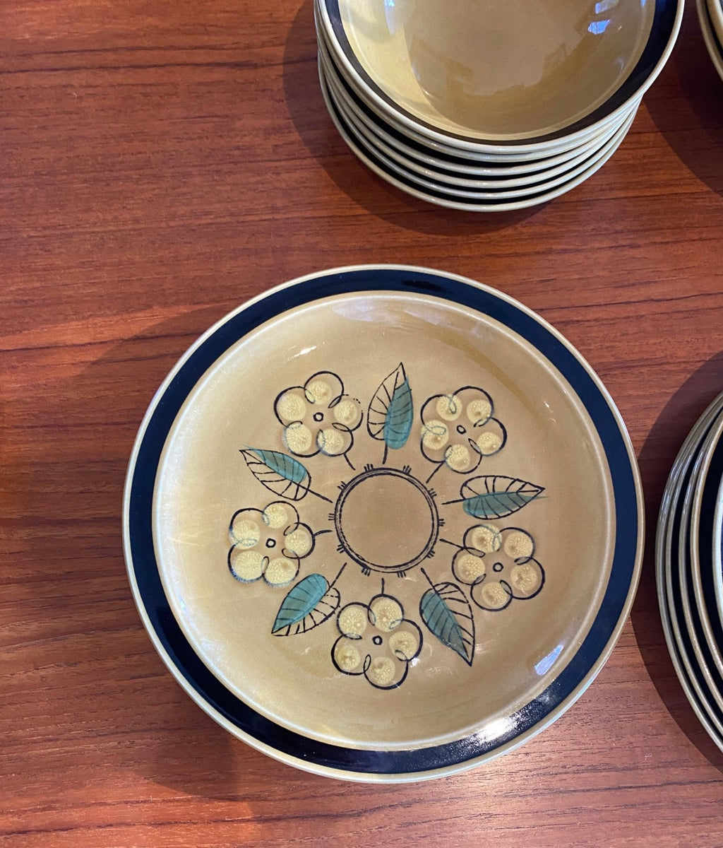 Mid-century stoneware by Crest-Stone, "Lisa" pattern with blue rim, earth tones and yellow flowers- Cook Street Vintage