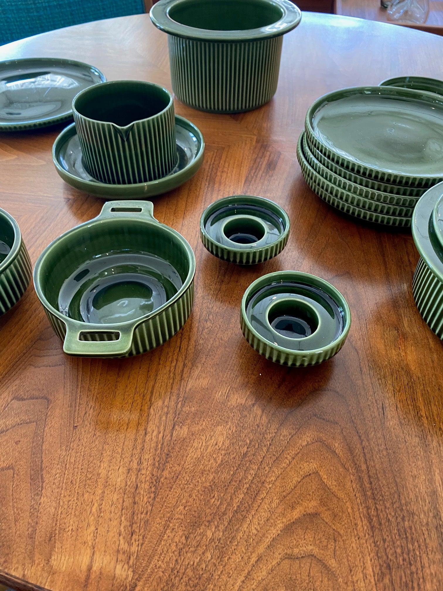 Cande holders from our Set of mid-century pottery designed by Fokke Hamming for De Driehoek. Dark forest green glaze with a modern striated design. Made in Huizen in Holland- Cook Street Vintage
