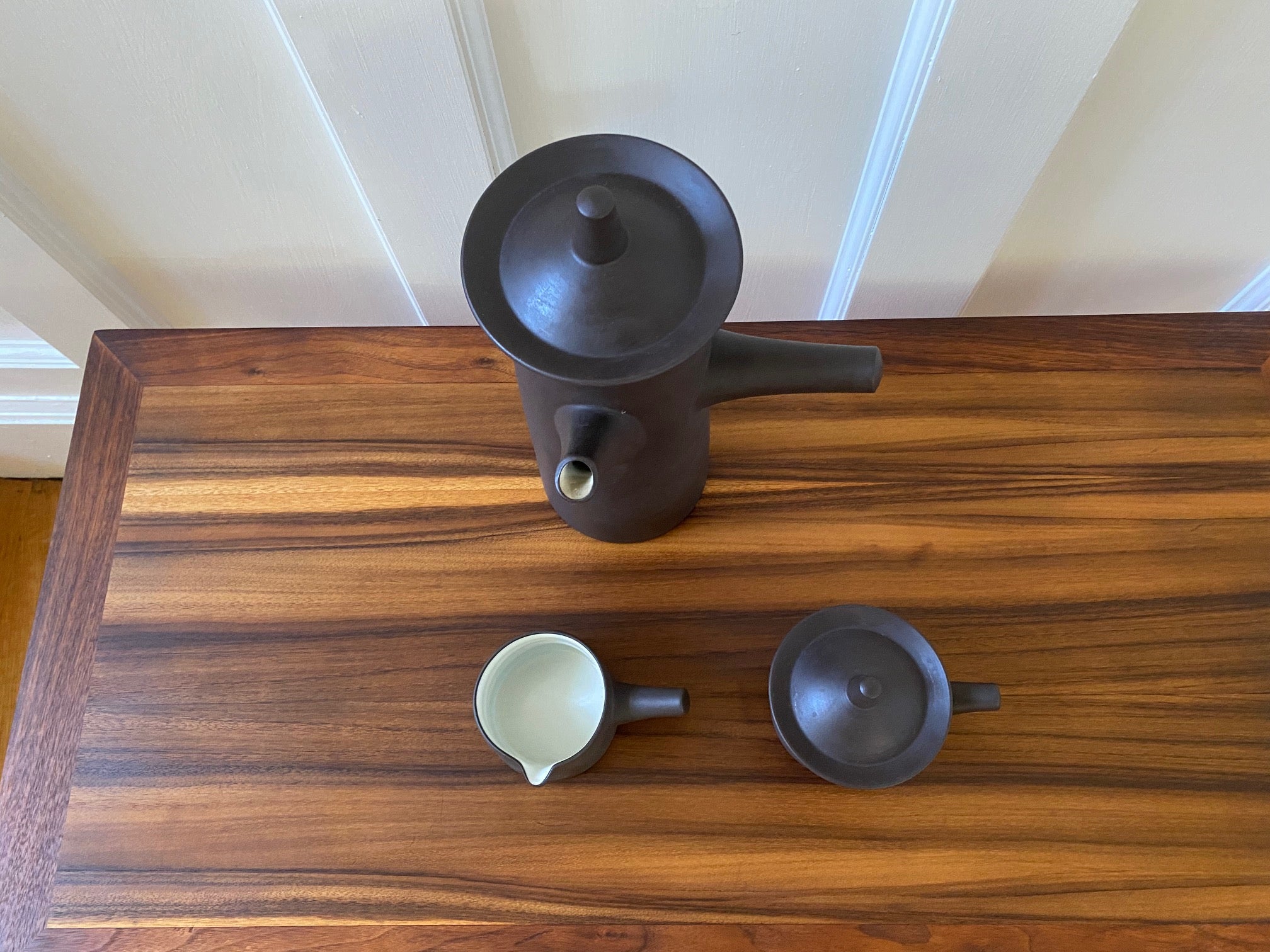 Top view of A beautiful coffee pot, creamer and sugar designed by Jens Harald Quistgaard for Dansk- Cook Street Vintage