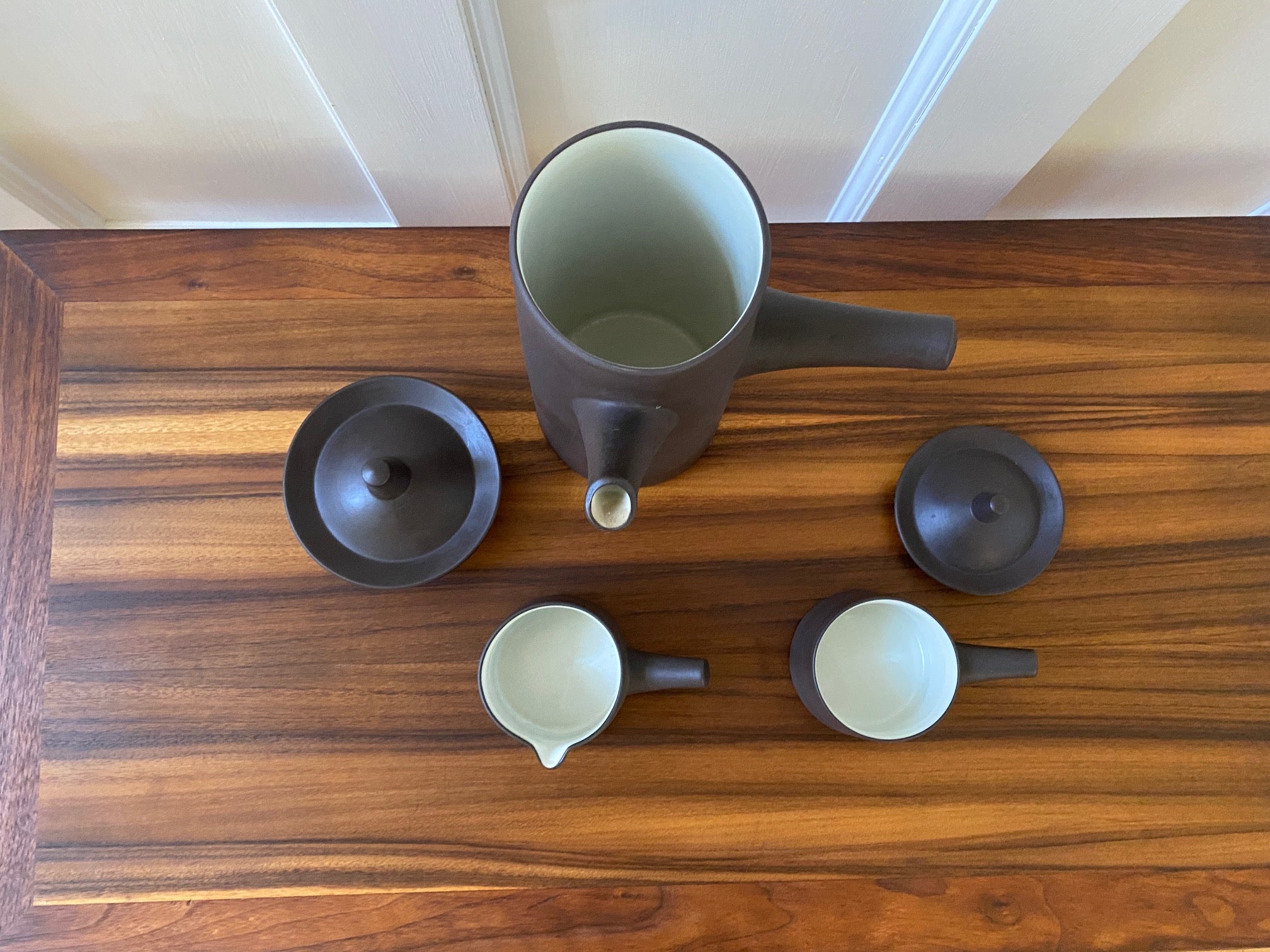 Top view with lids off coffee pot and sugar bowl for A beautiful coffee pot, creamer and sugar designed by Jens Harald Quistgaard for Dansk- Cook Street Vintage