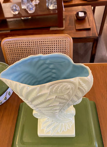 Stunning MCM Beswick vase in the “Fernbank” model #1191, designed by James Howard in 1950. This classic cornucopia-shaped piece, inspired by unfurling fern fronds is a plae green with a beautiful powder blue interior glaze. No chips or crazinng- Cook Street Vintage.