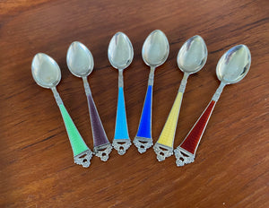 A lovely set of 6 Guilloche Sterling Silver and Enamel Demitasse spoons attributed to Niles Hansen. Pretty accompaniments for a charcuterie board, for condiments are as coffee spoons.     One each of green, plum, aquamarine blue, royal blue, yellow and scarlet red-Cook Street Vintage