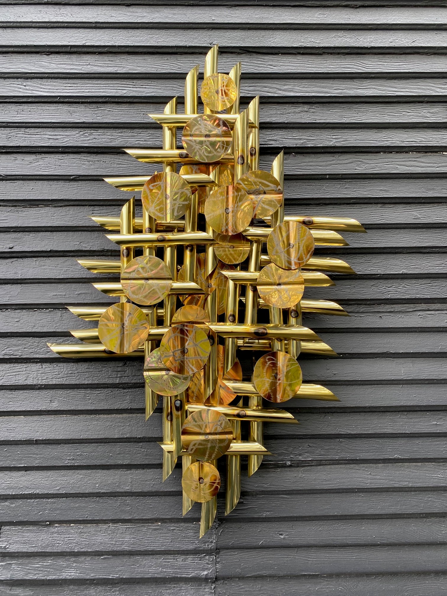 A striking mid-century torched metal art display in brass, with original label. Can be hung vertically or horizontally. Made in Canada.- Cook Street Vintage